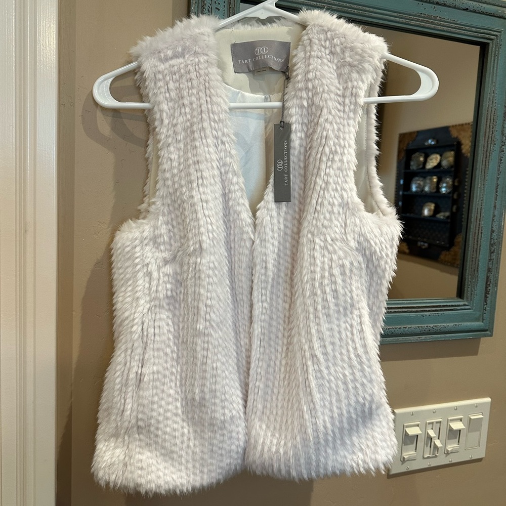 Tart fur vest